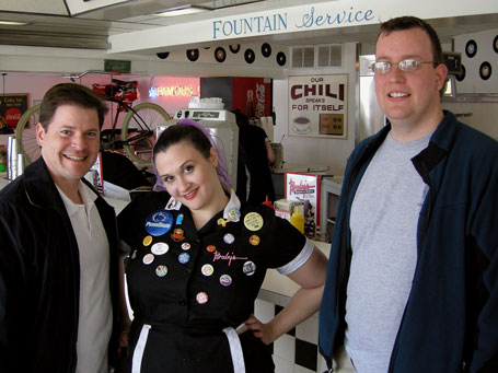 Berty and Mattski pose with a waitress at Baby's Burgers and Shakes
